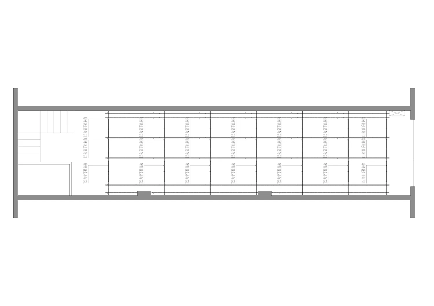 White and black architectural blueprint of a building layout plan.