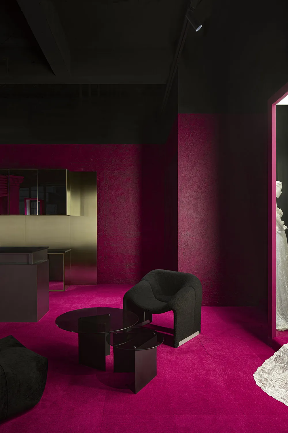 A modern retail storefront with metallic finishes, featuring sleek, minimalist design elements and a vibrant color palette.