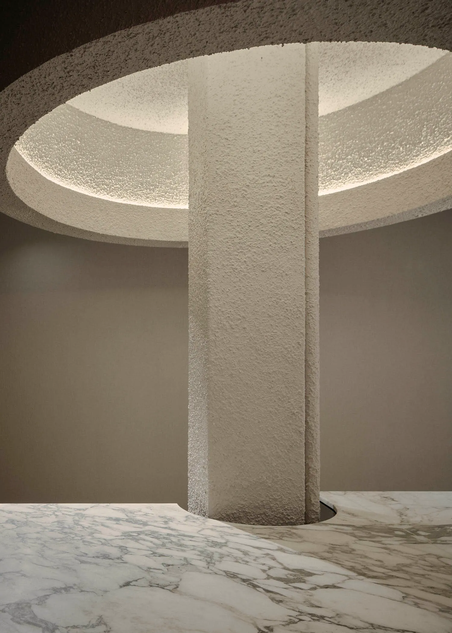 Modern design featuring marble materials in an interior setting.