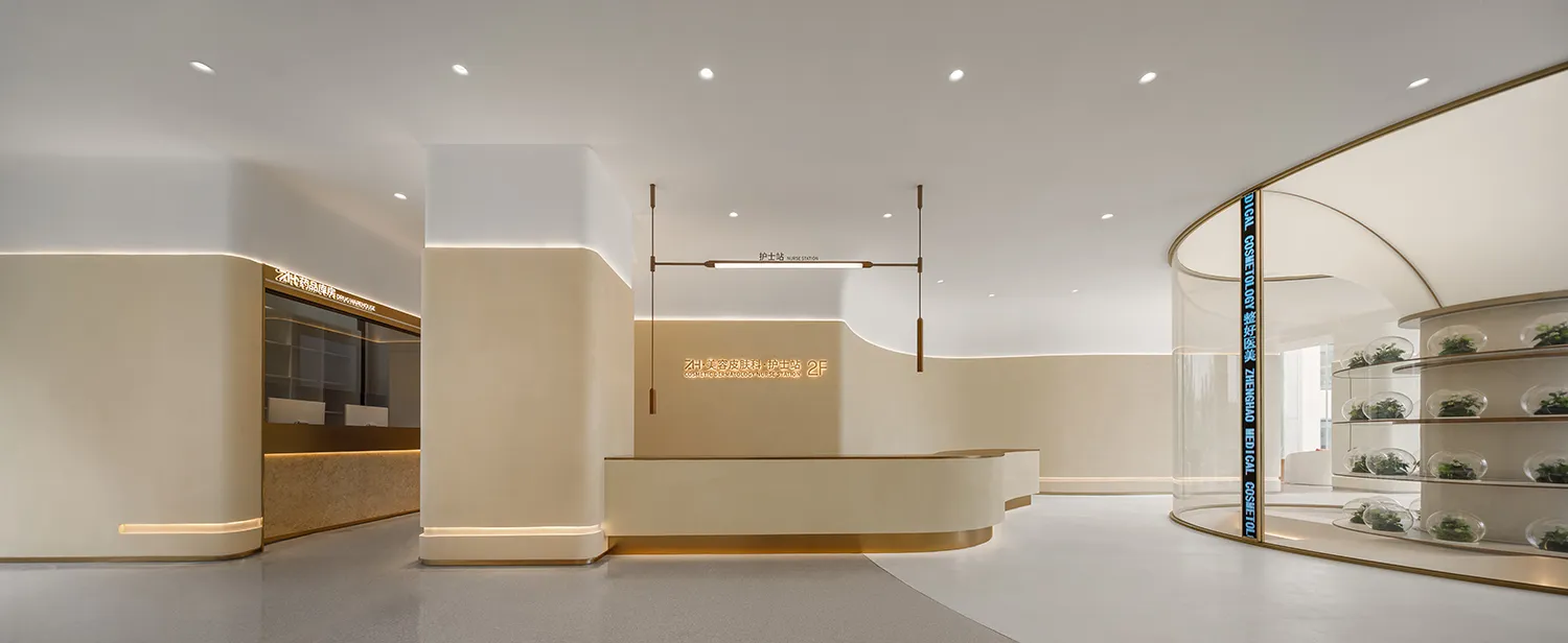 Modern interior of a hospital lobby with beige stone materials