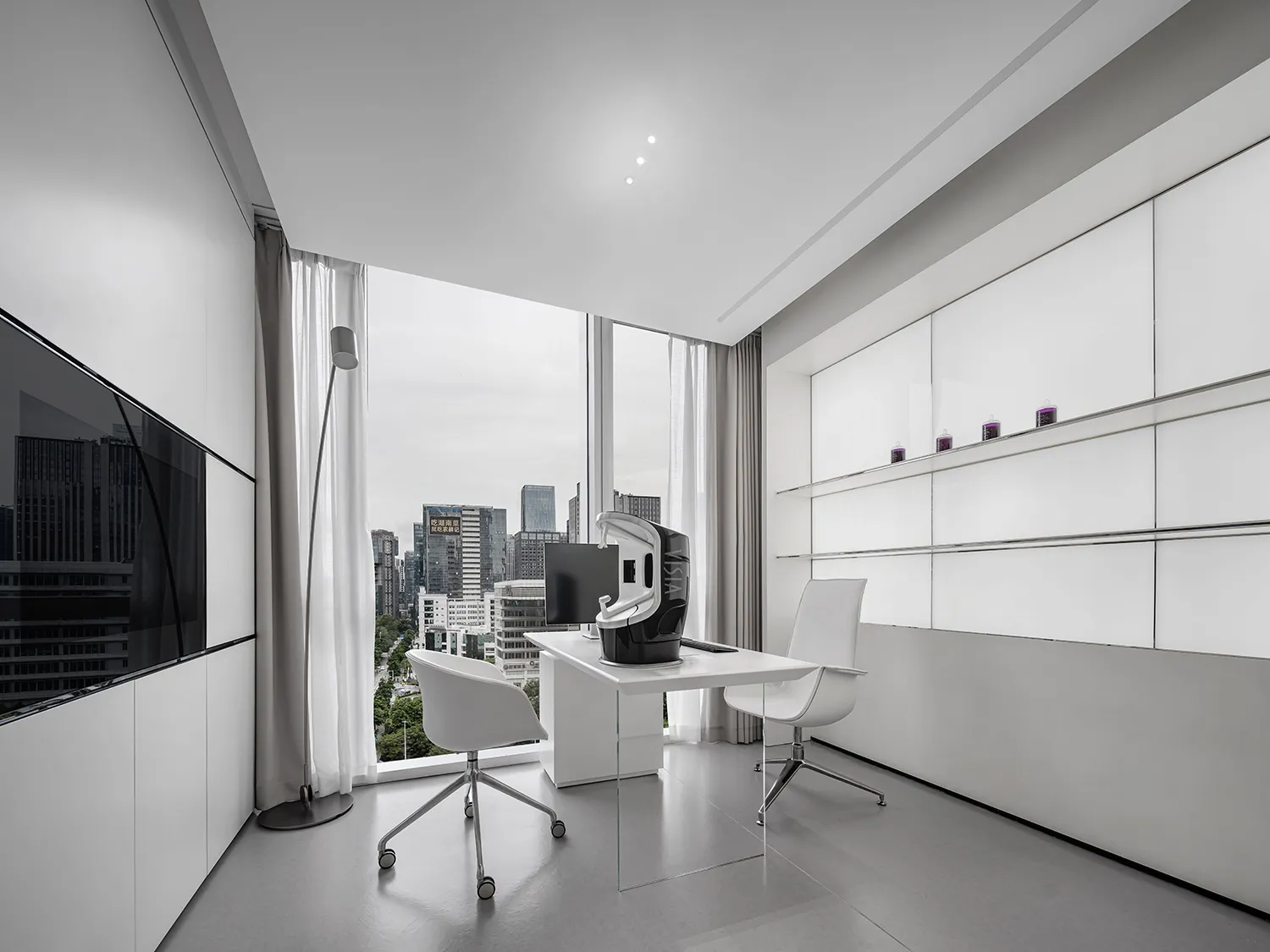 Minimalist modern office with white furniture, glass walls, and a metal desk.