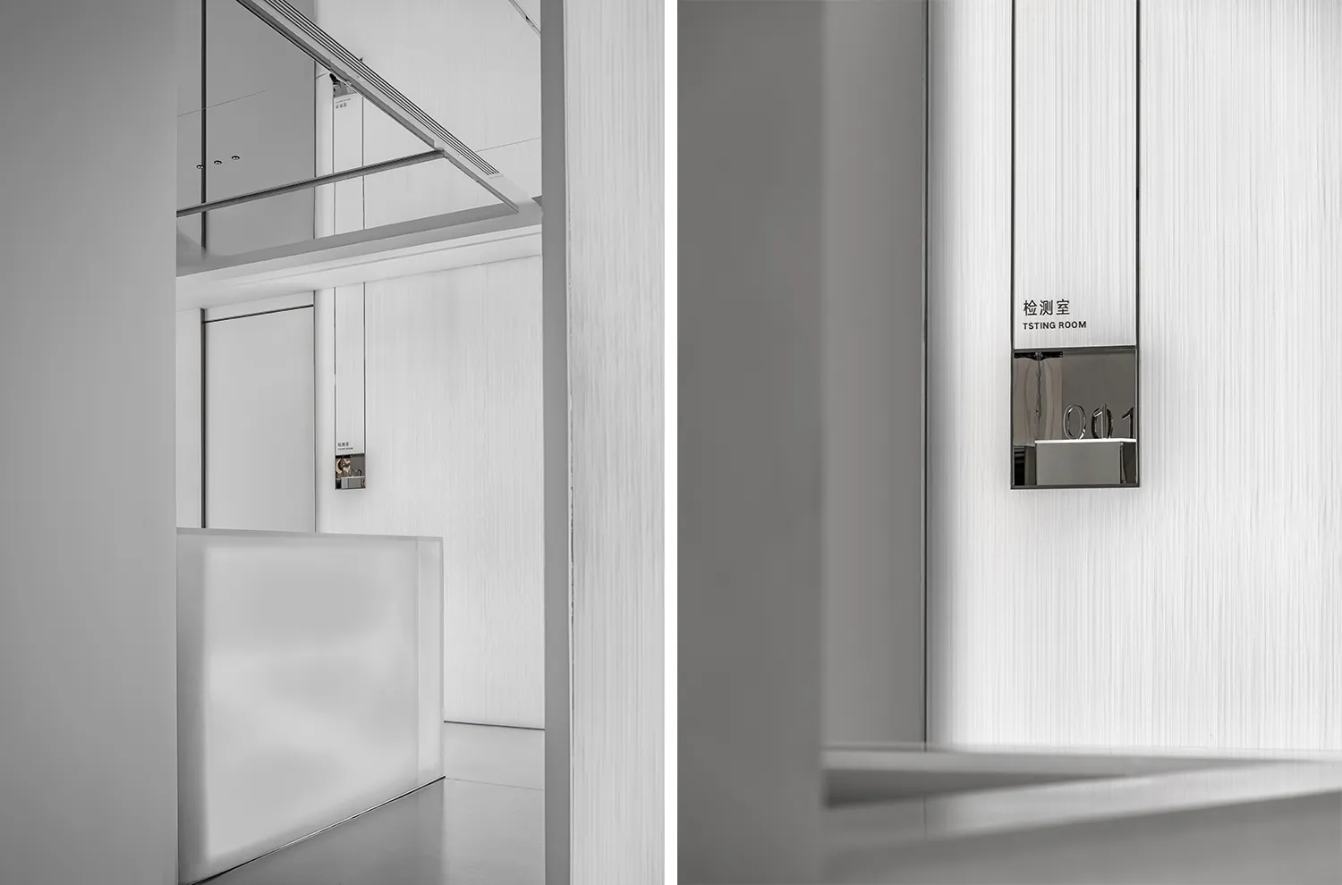 A minimalist office interior with metallic wall panels and sleek, white surfaces.