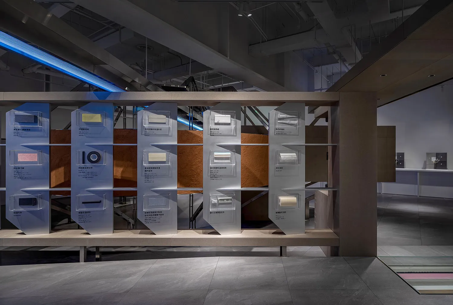 A display of modern architectural material samples in a designed environment.