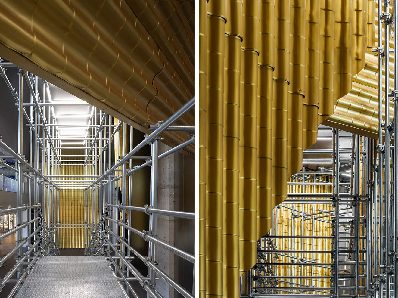 Scaffolding and construction site with metal pipes and corrugated gold panels