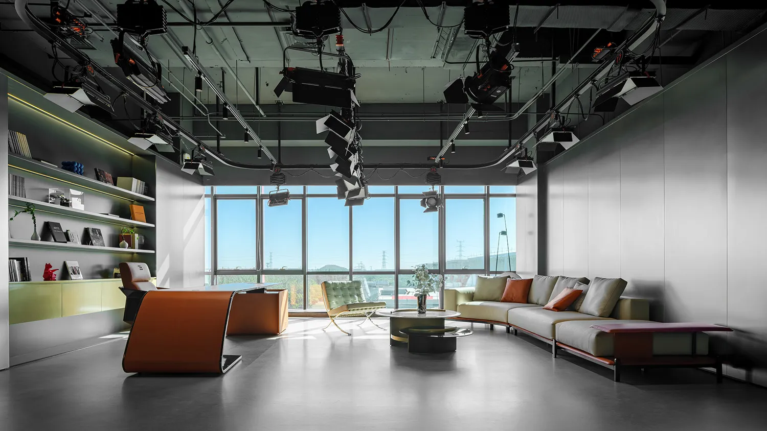Modern office space featuring concrete and glass materials.