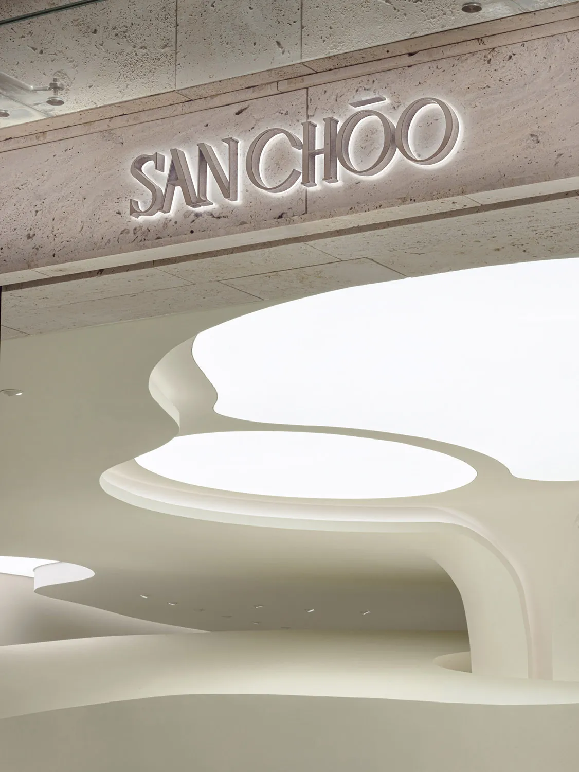Modern retail interior with white and black packaging design elements.