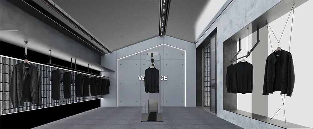 Modern retail storefront with minimalist design, featuring clothing racks and a branded backdrop in a concrete-like finish.