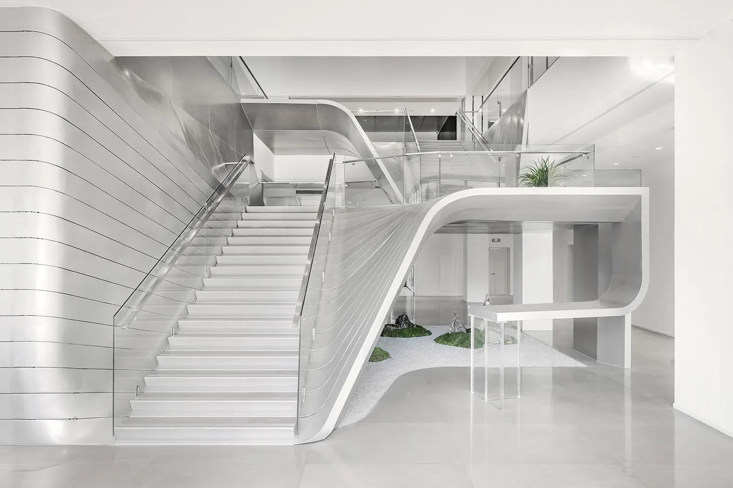 White, metal, and glass modern interior design with concrete elements
