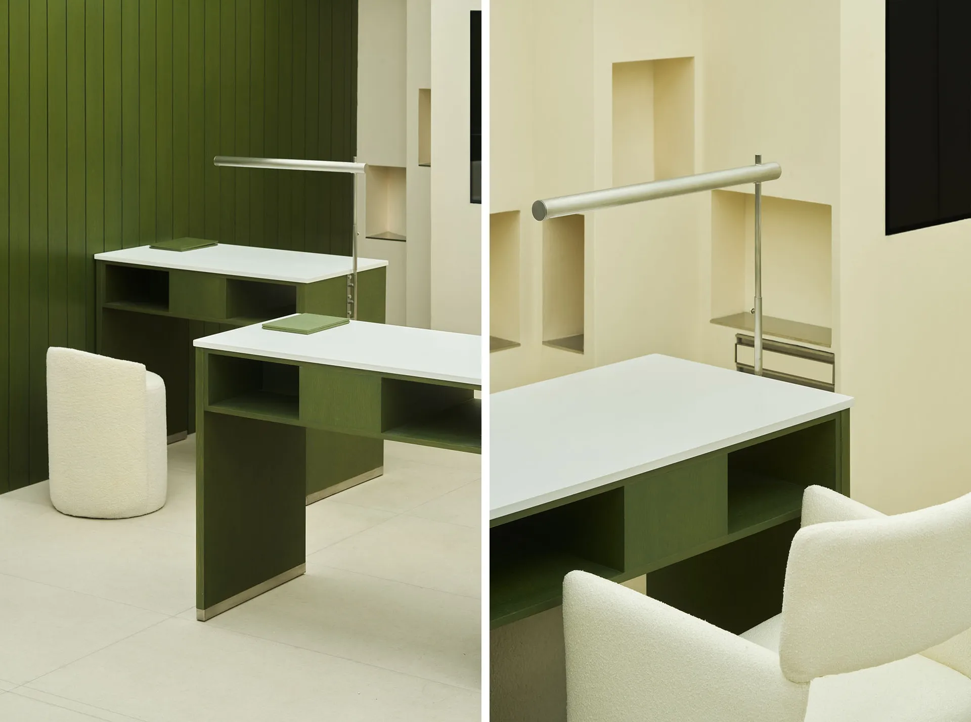 A modern green desk space with a white tabletop and a white upholstered chair.