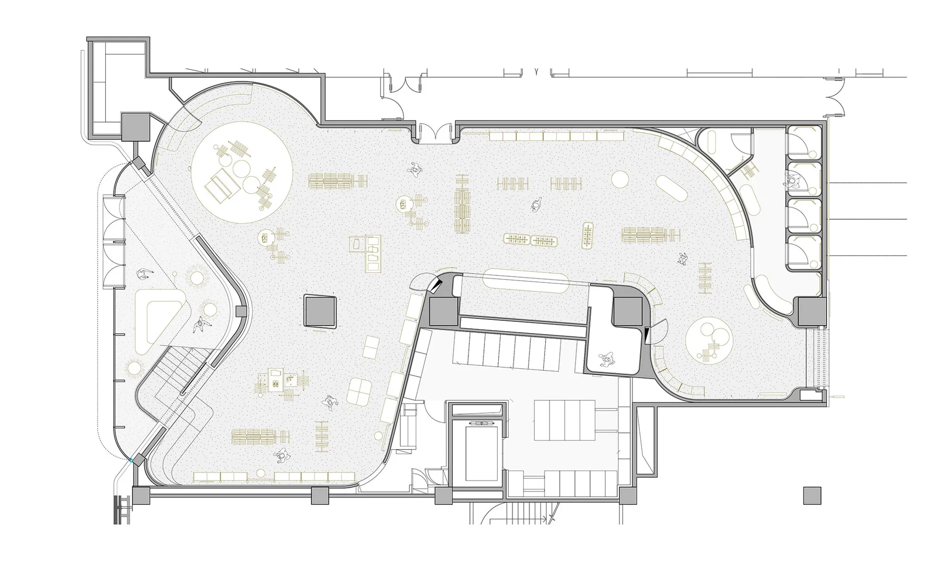 Floor plan of an open-plan workspace with wooden furniture.