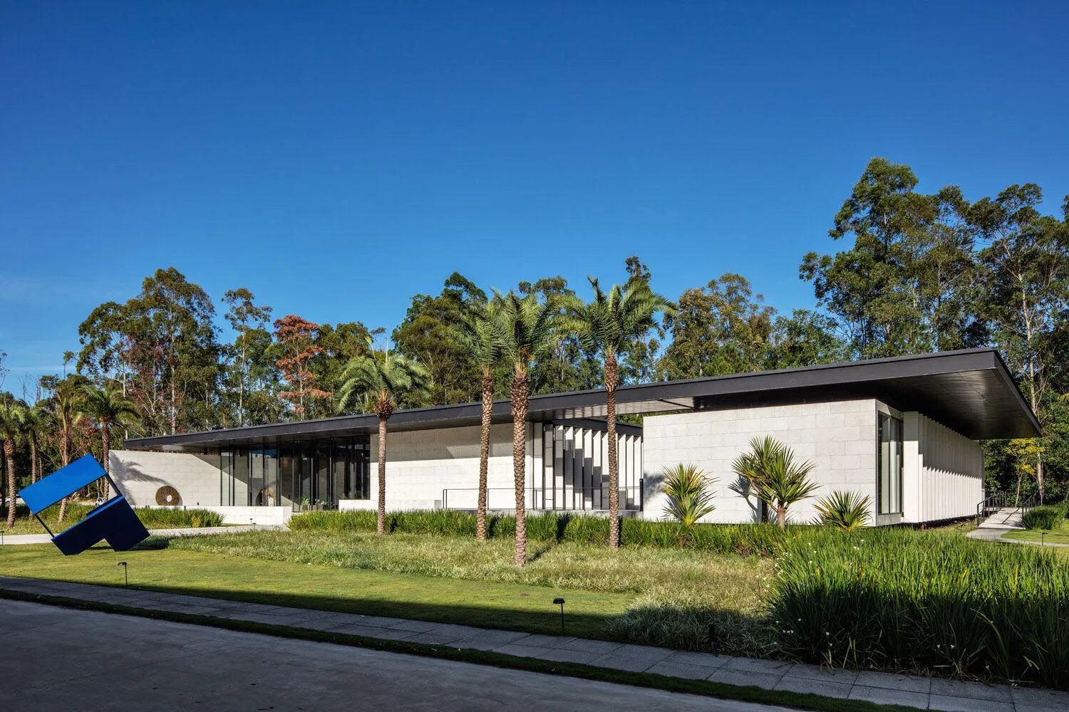 Modern building with concrete exterior and large glass windows