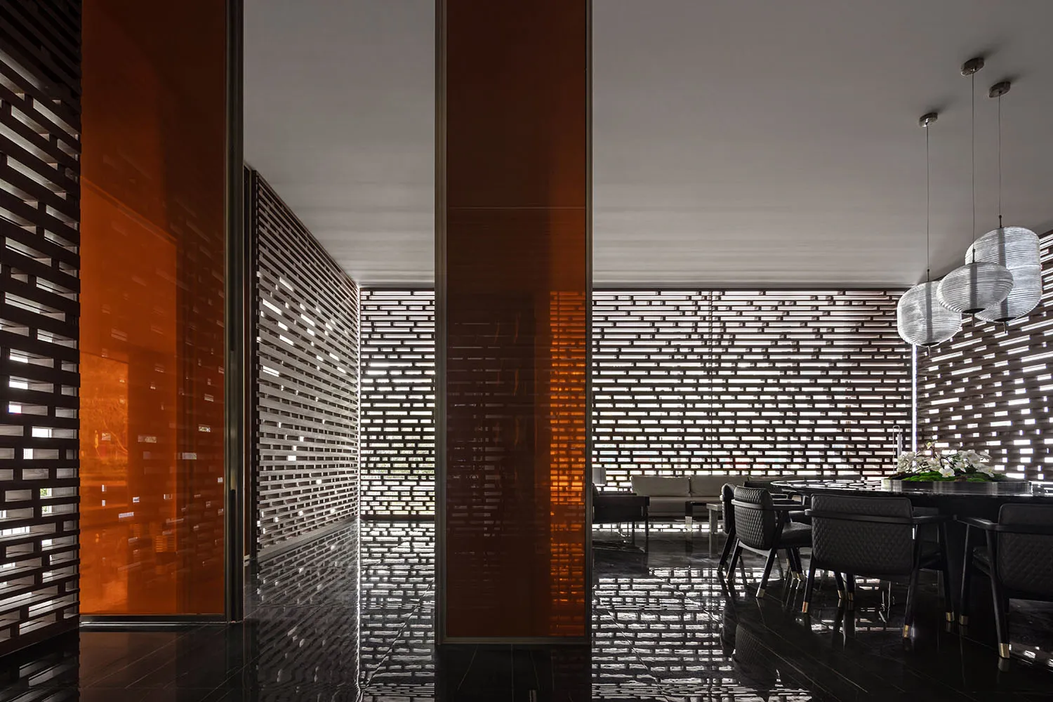 A modern interior design with brick and glass materials.