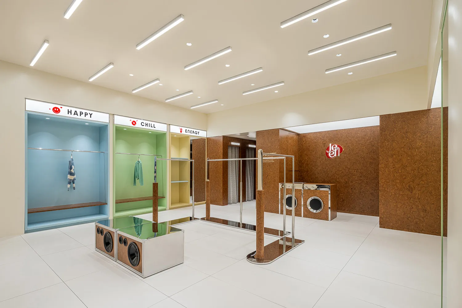 Modern clothing shop with colorful sections and wooden fixtures
