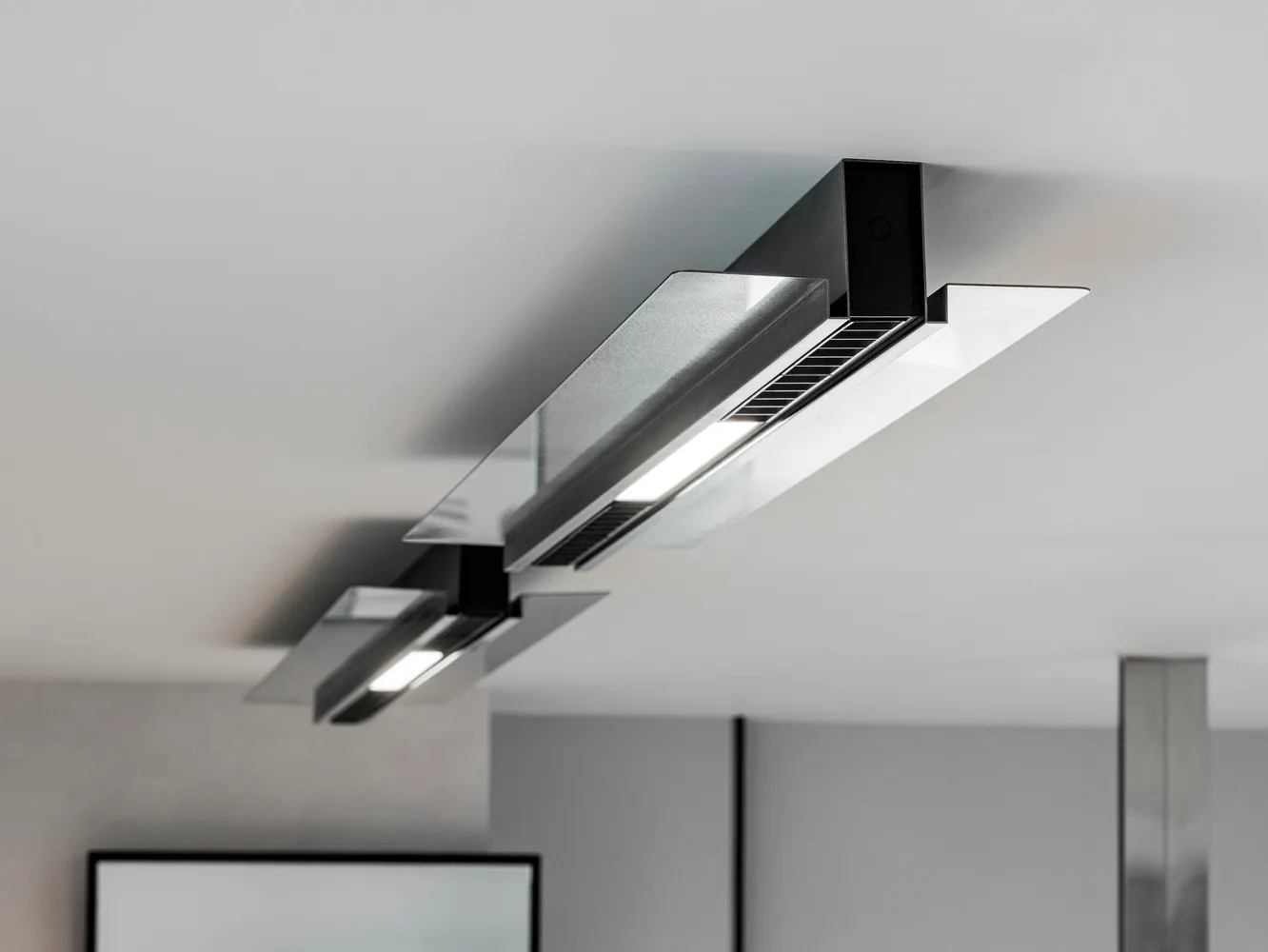 Modern, industrial-style office ceiling lights