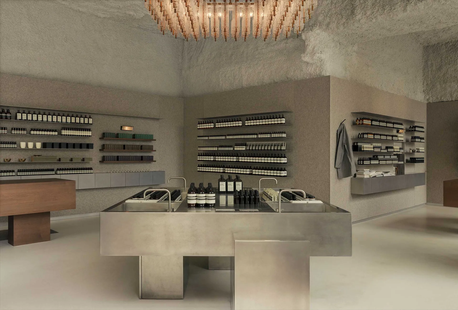 Modern retail storefront with concrete interior features, showcasing contemporary design elements.