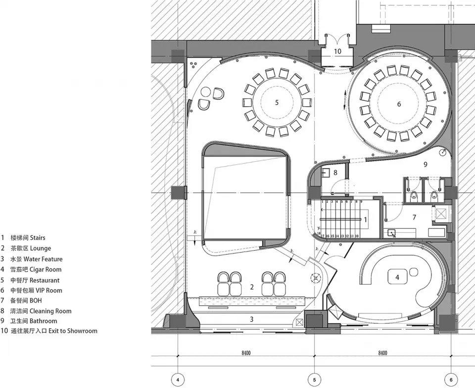 Floor plan of an architectural design featuring a restaurant interior with concrete, glass, and metal materials.