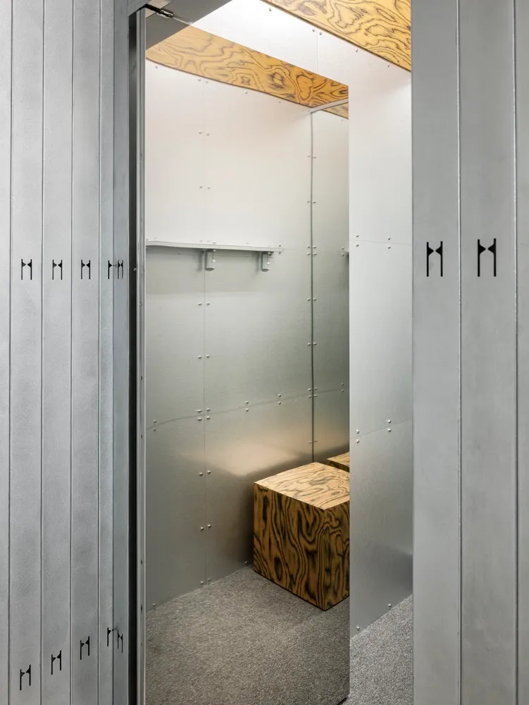 A minimalist, metal storage locker system with sleek lines and functional design.