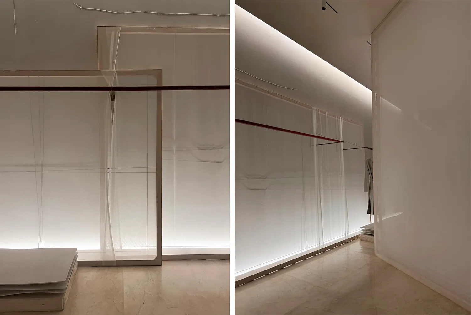 White architectural interior design featuring sheer curtains and soft lighting.