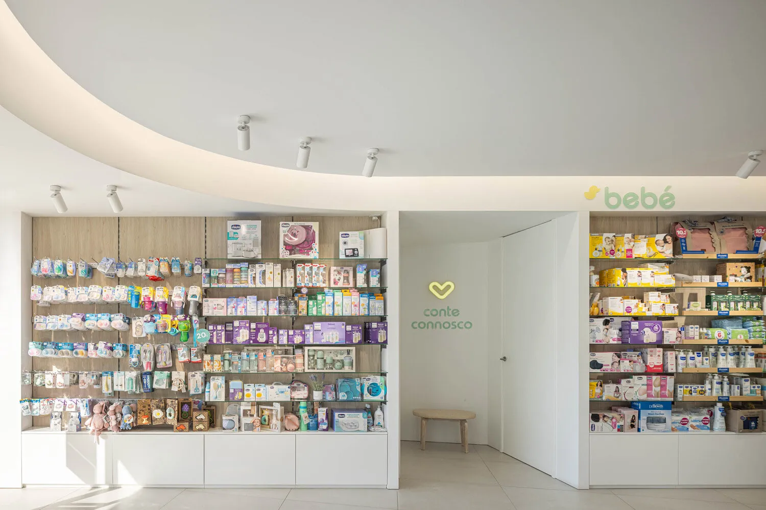 A well-lit, modern baby store filled with various products and displays.