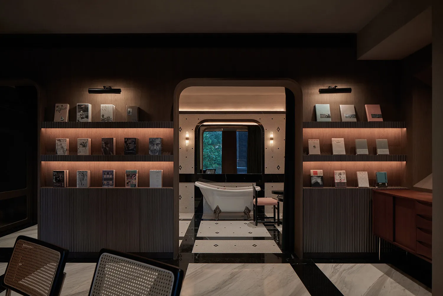 A modern lounge area featuring wooden elements and a cozy atmosphere.