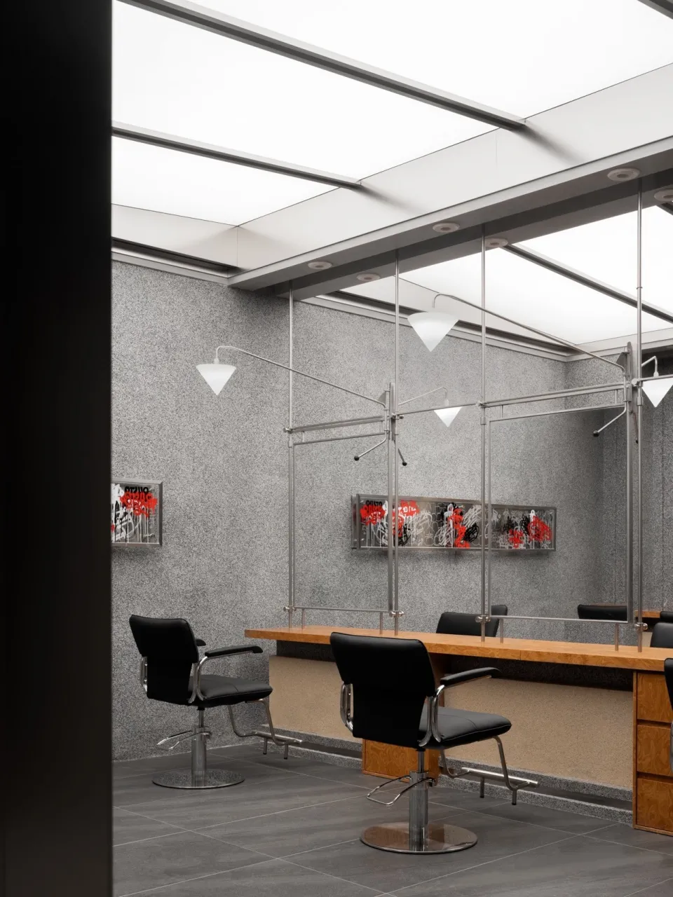 A modern industrial workplace with a metal-frame design.