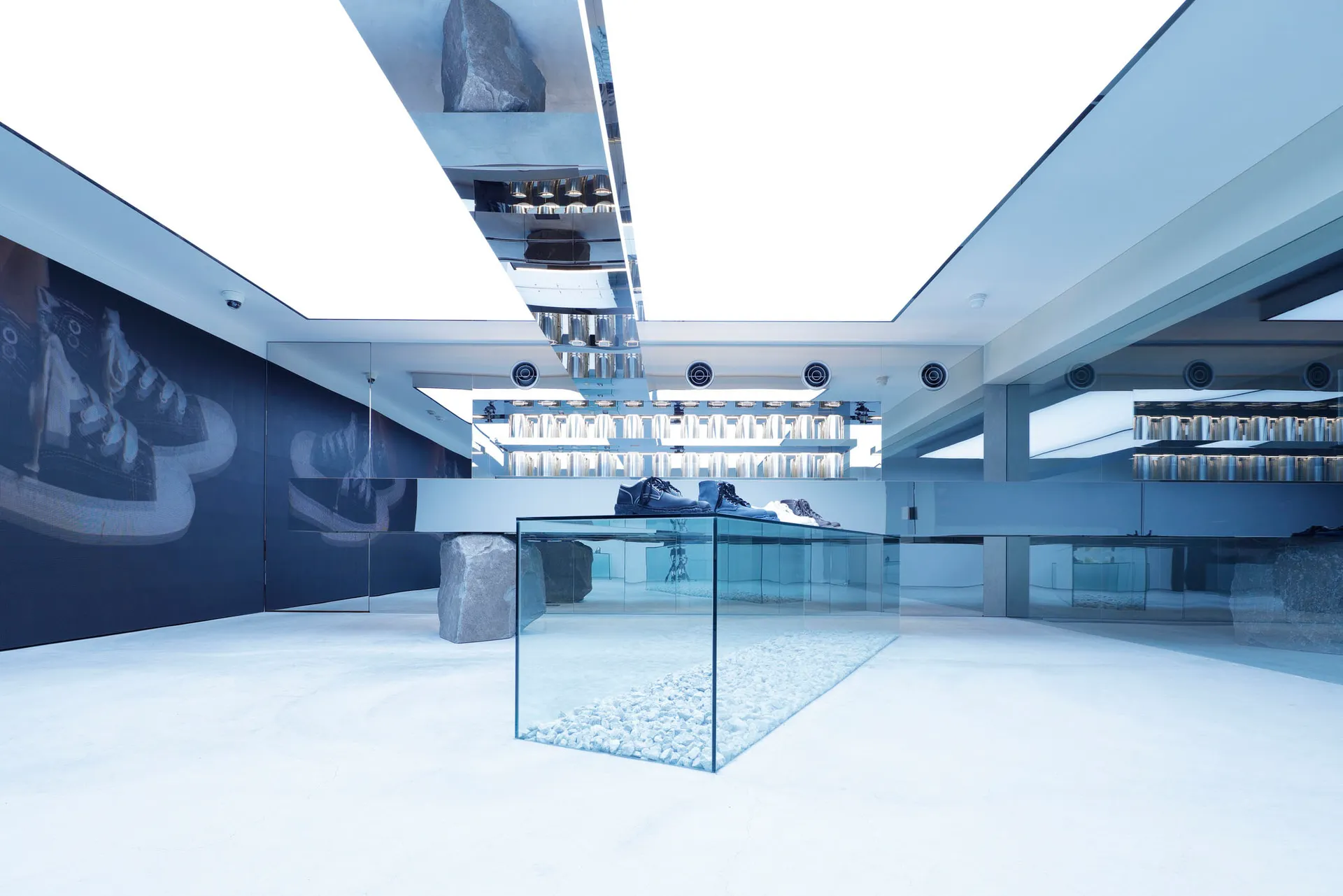 Modern minimalist retail space showcases innovative concrete and emerging materials.