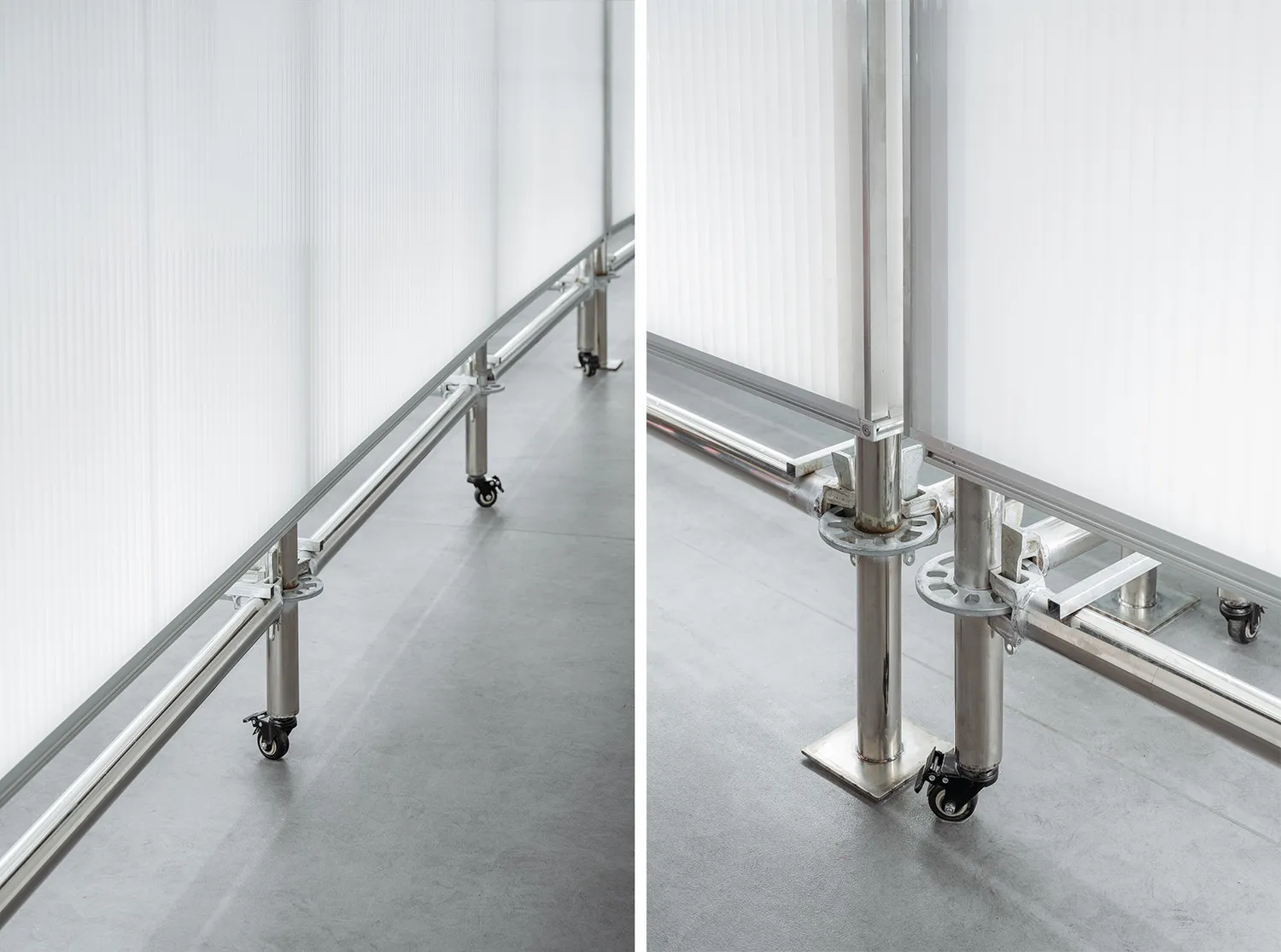 An industrial space featuring metal and wheels on a concrete floor.
