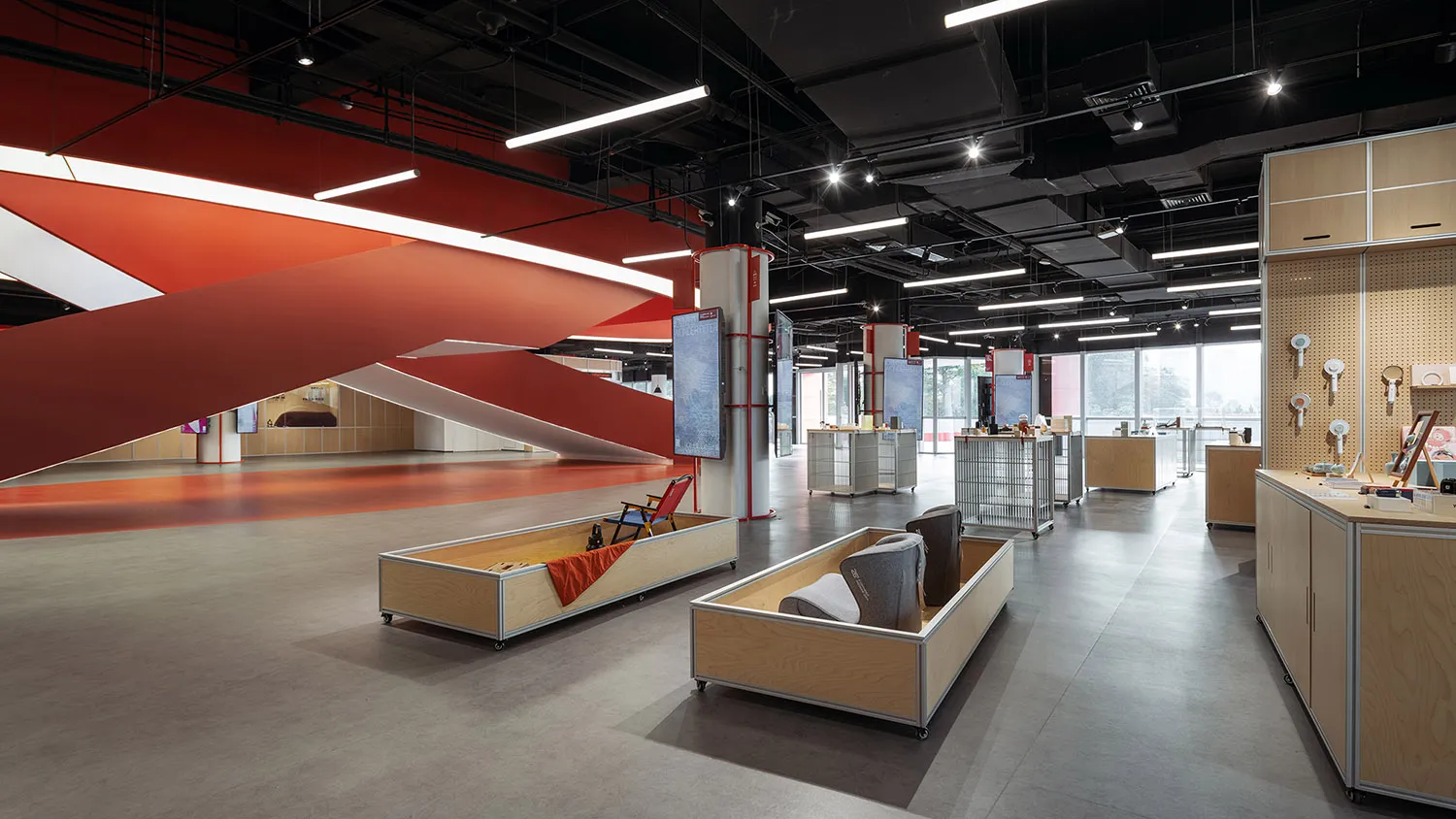 Office space featuring contemporary design with wooden furniture and a minimalist approach.