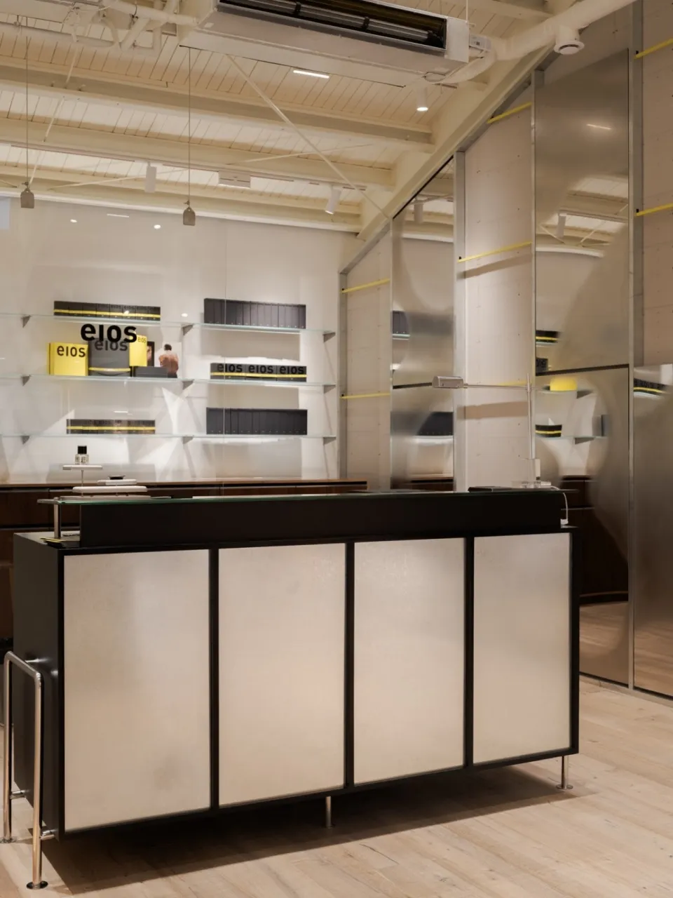 A minimalist retail storefront with clear shelves.