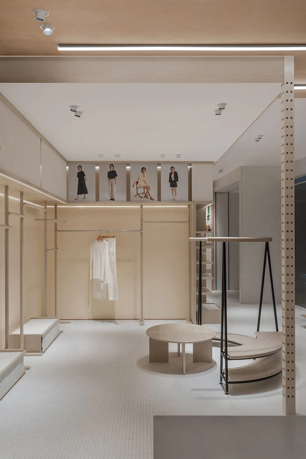 Modern retail store interior designed with wooden elements and minimalist aesthetic.