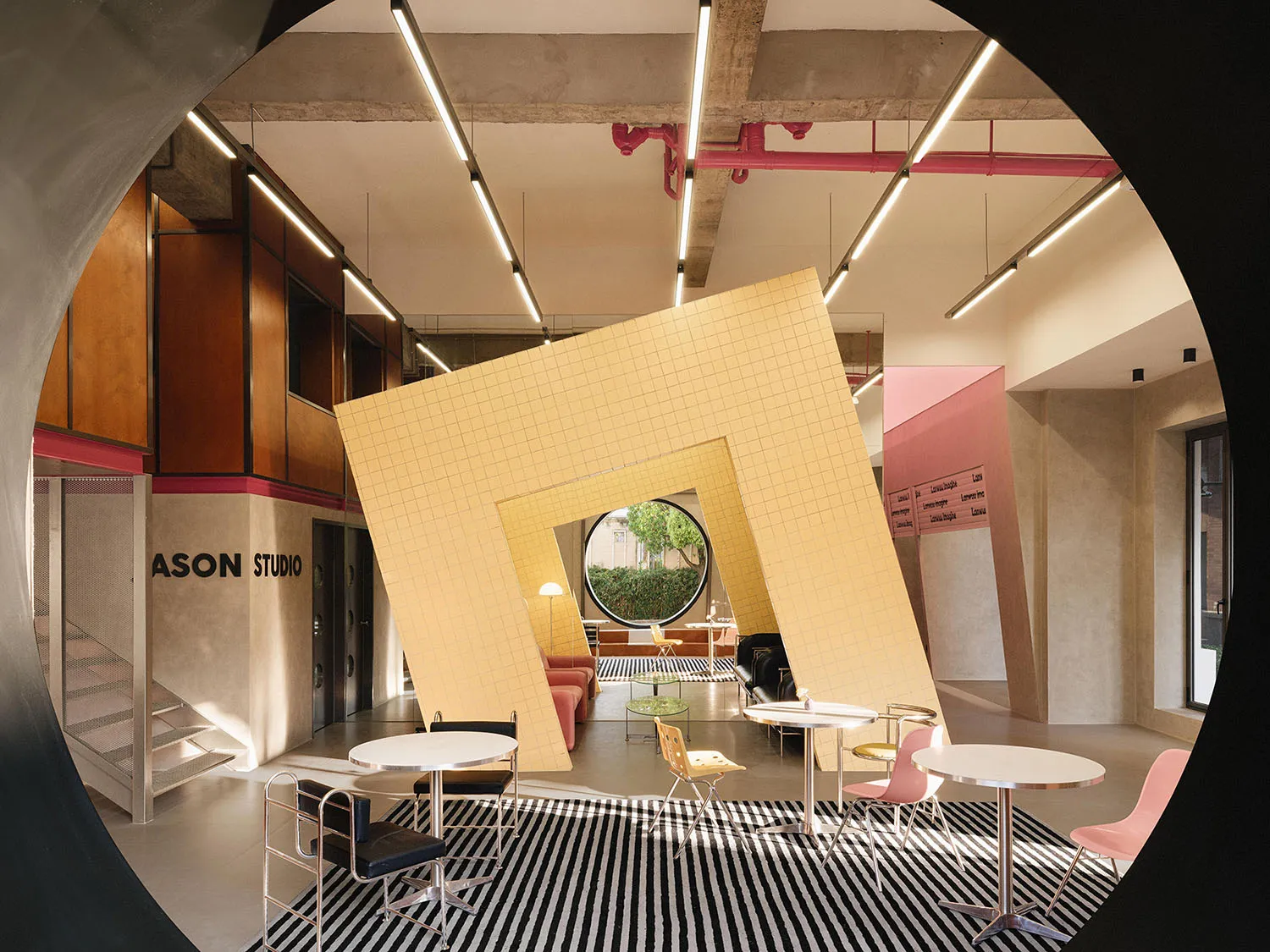 Industrial-style coffee shop interior with wooden elements