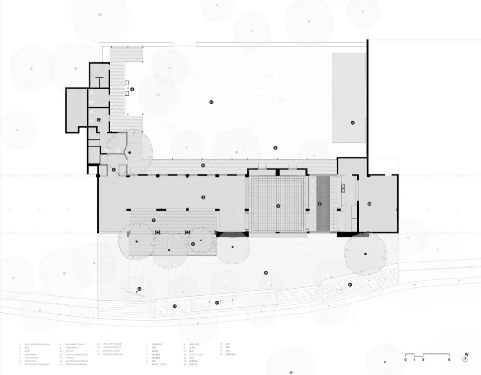 A detailed 2D architectural drawing of a modern building floor plan featuring exposed concrete elements.