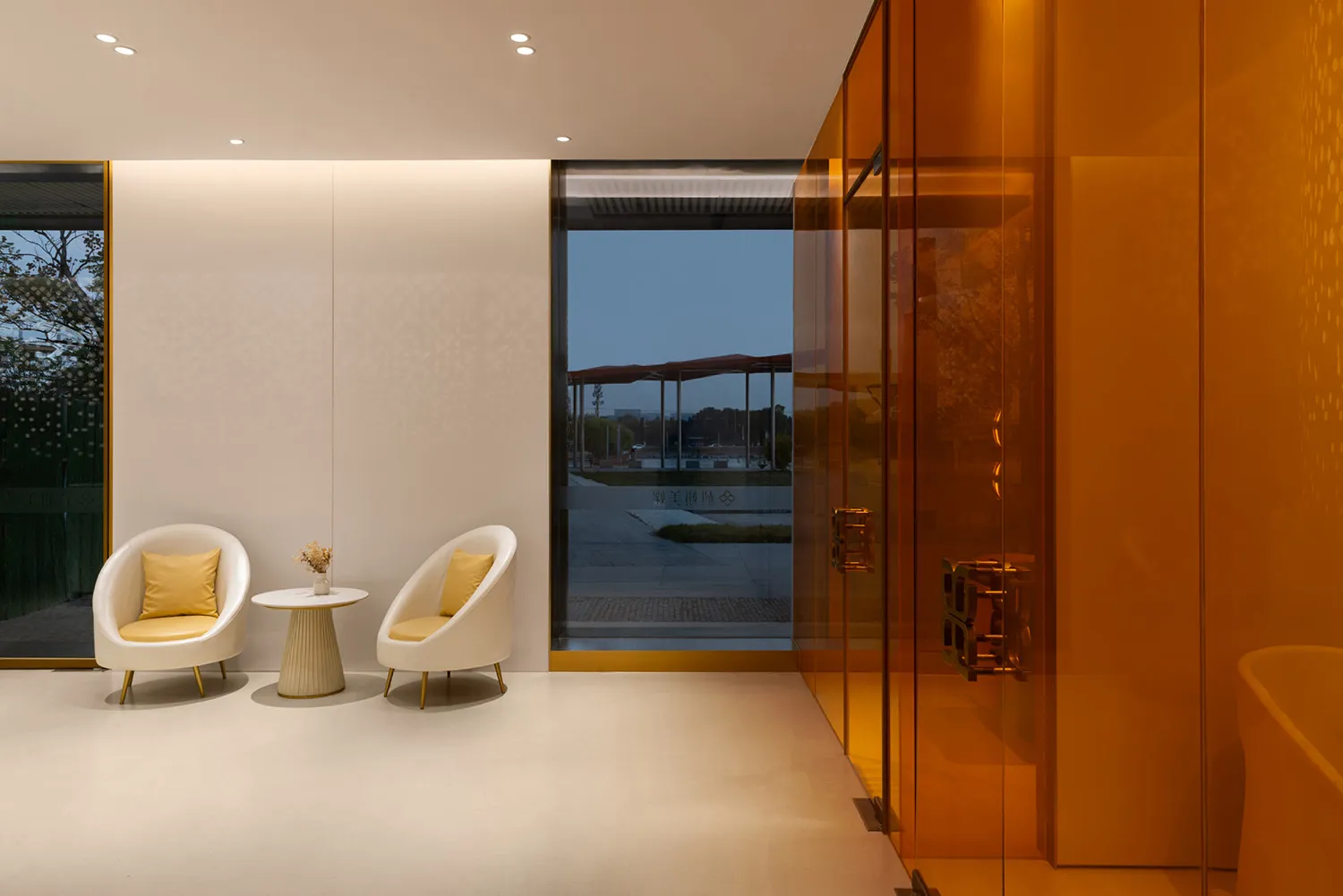 A modern lobby designed with glass elements.