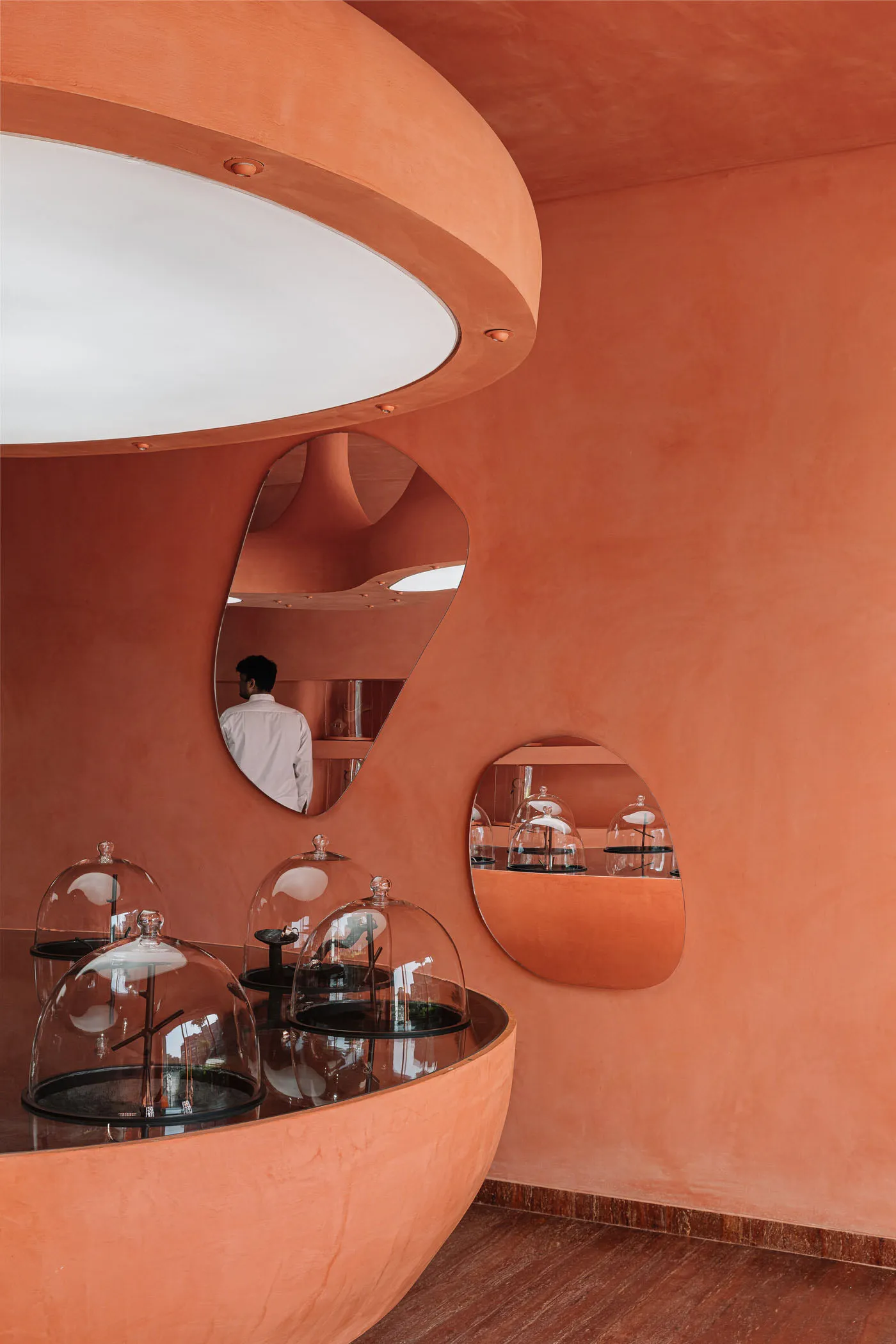Modern retail store with glass and curved architectural elements.