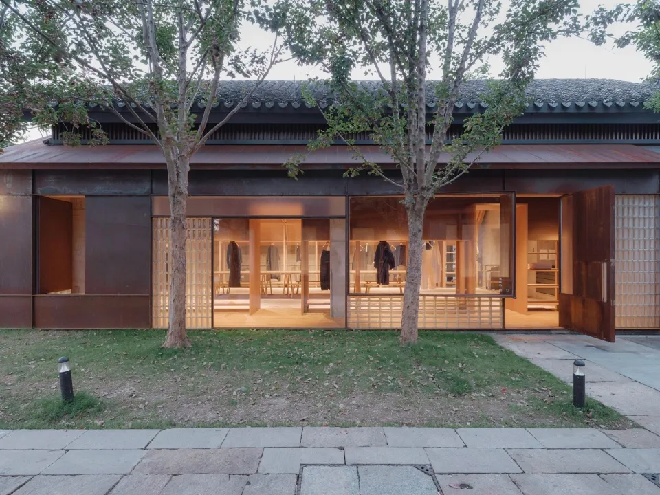 A modern storefront with glass walls and interior