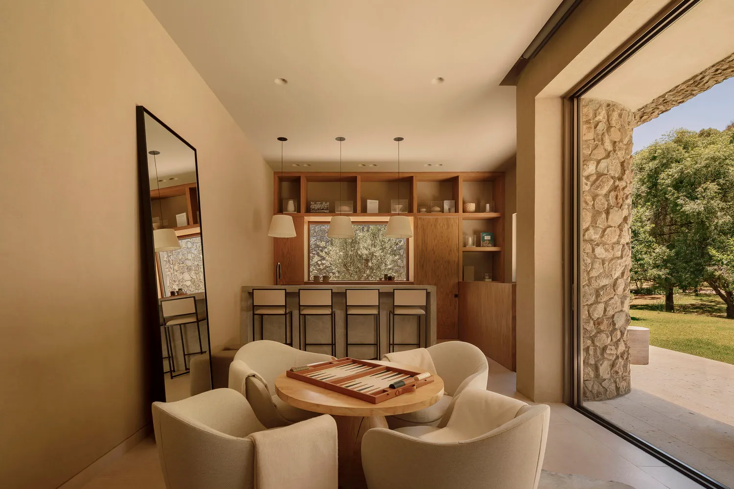 Modern interior design featuring sleek, minimalist furniture with a concrete wall backdrop.