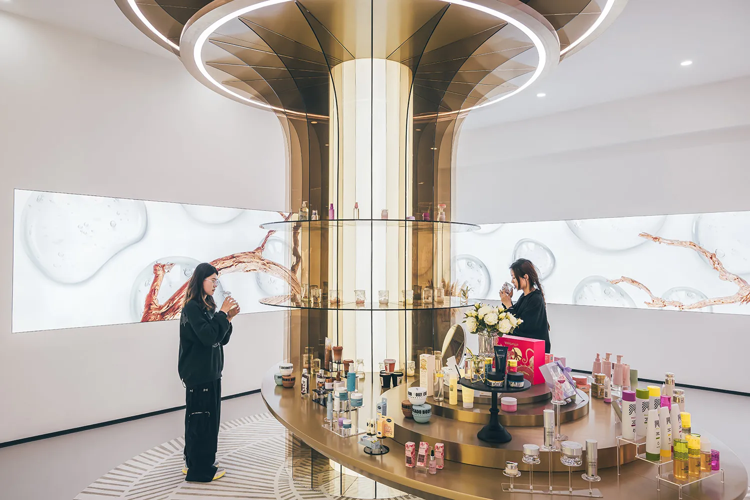 Modern retail display featuring glass and metal structures.