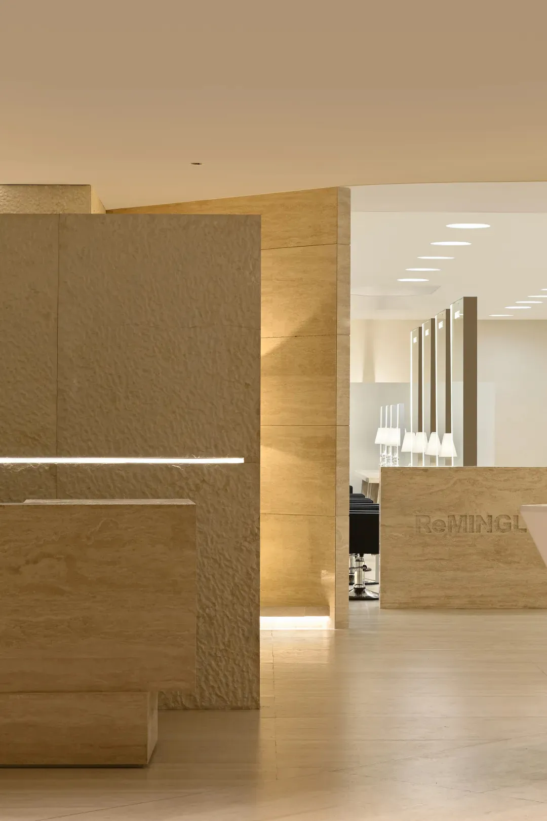 Modern salon interior design featuring stone construction materials.