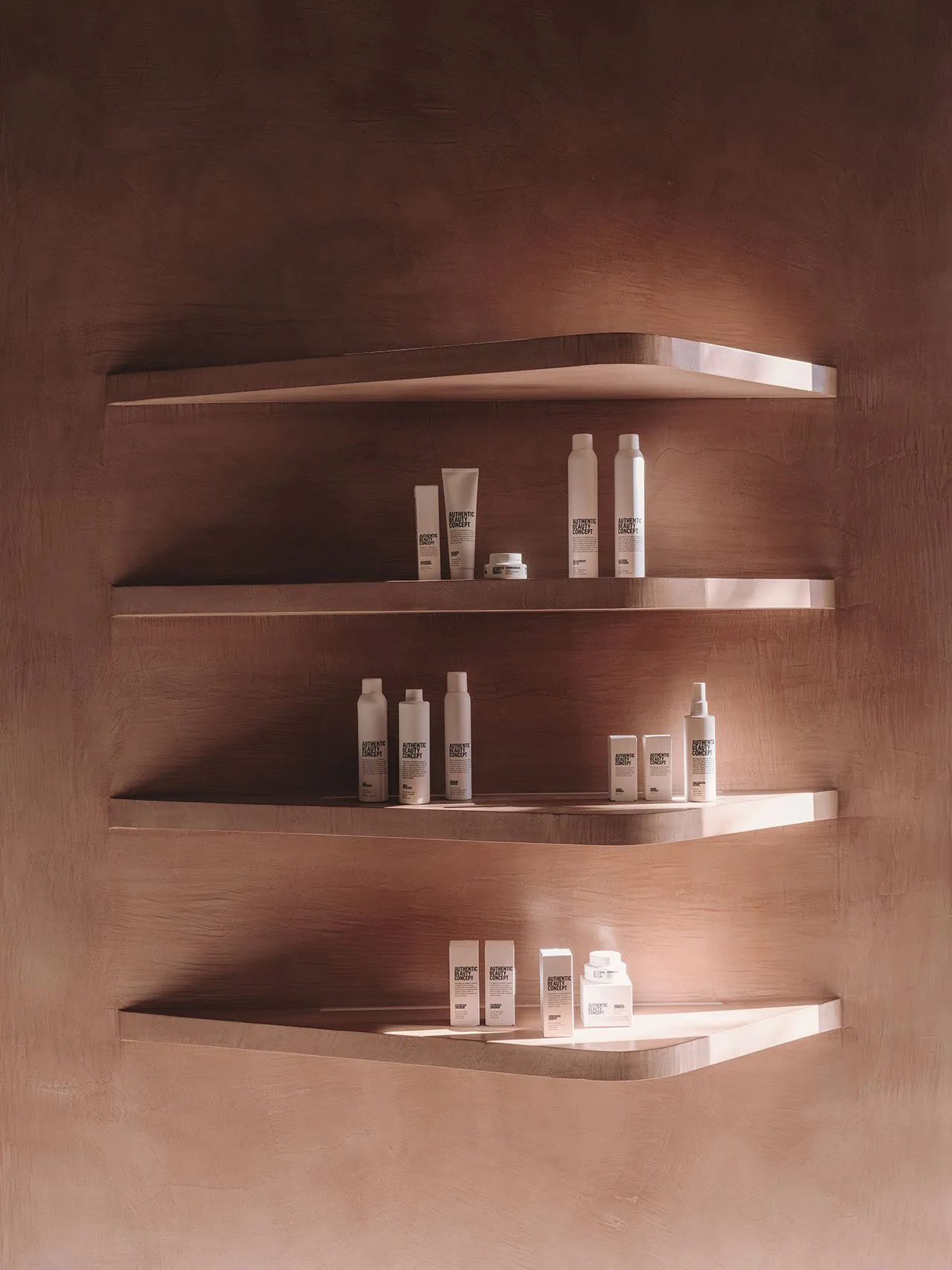 A modern retail display featuring wooden shelves with beauty products.