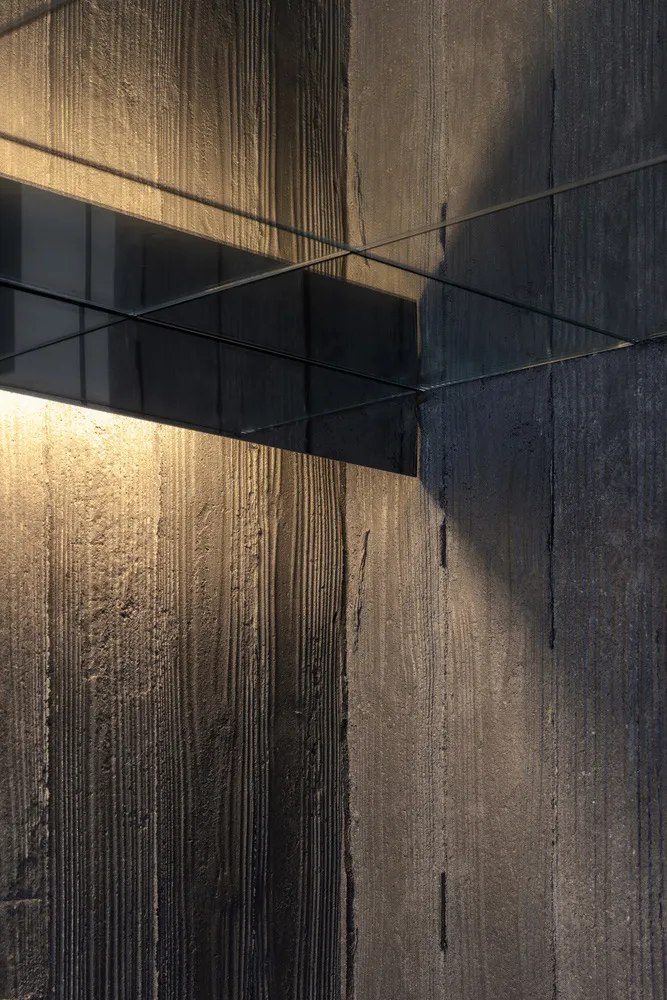 Concrete and glass architectural elements in an interior design setting