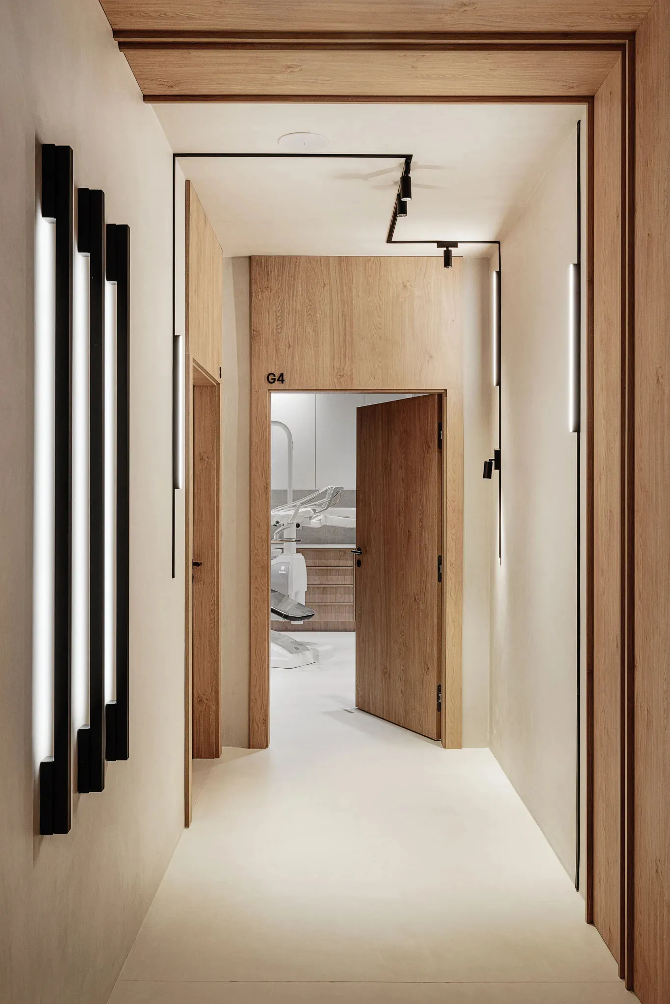 A minimalist office with wooden and concrete materials.