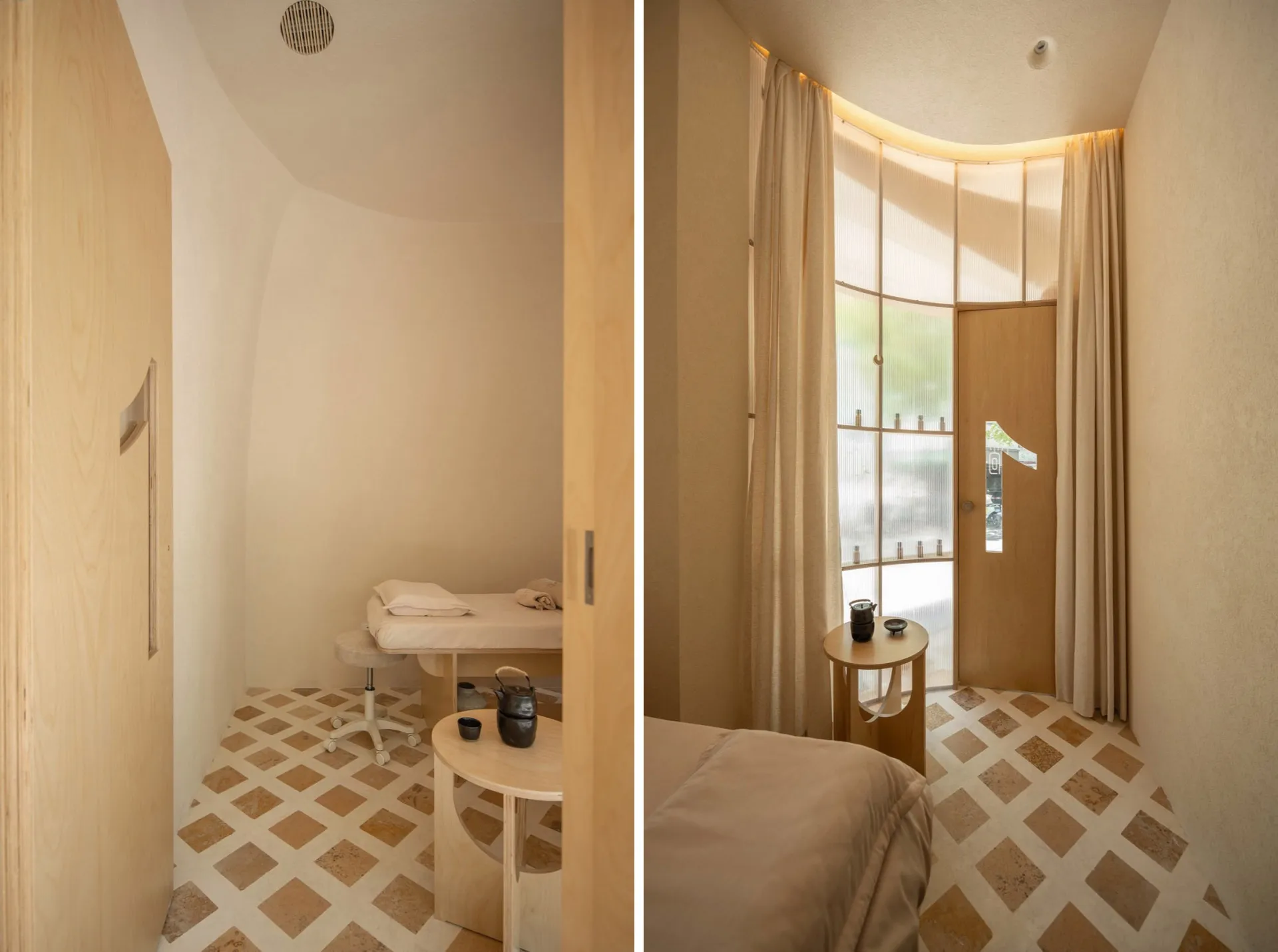 A modern hotel suite featuring wooden furniture and flooring.
