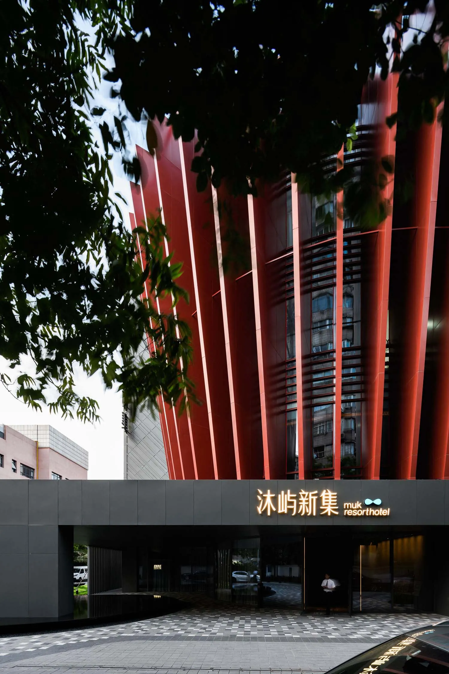 Modern hotel entrance with glass architectural elements