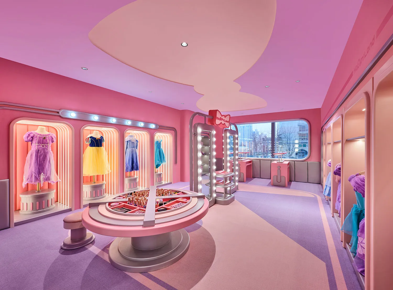 An image of a retail playroom with vibrant pink materials.