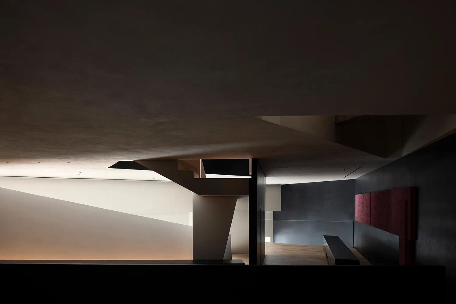 Modern minimalist interior design featuring concrete material.