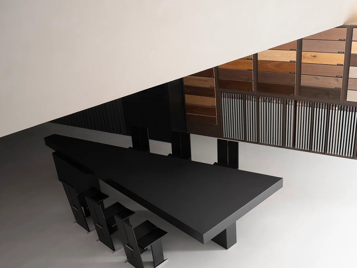 A modern office space with a sleek, minimalist design featuring metal elements.