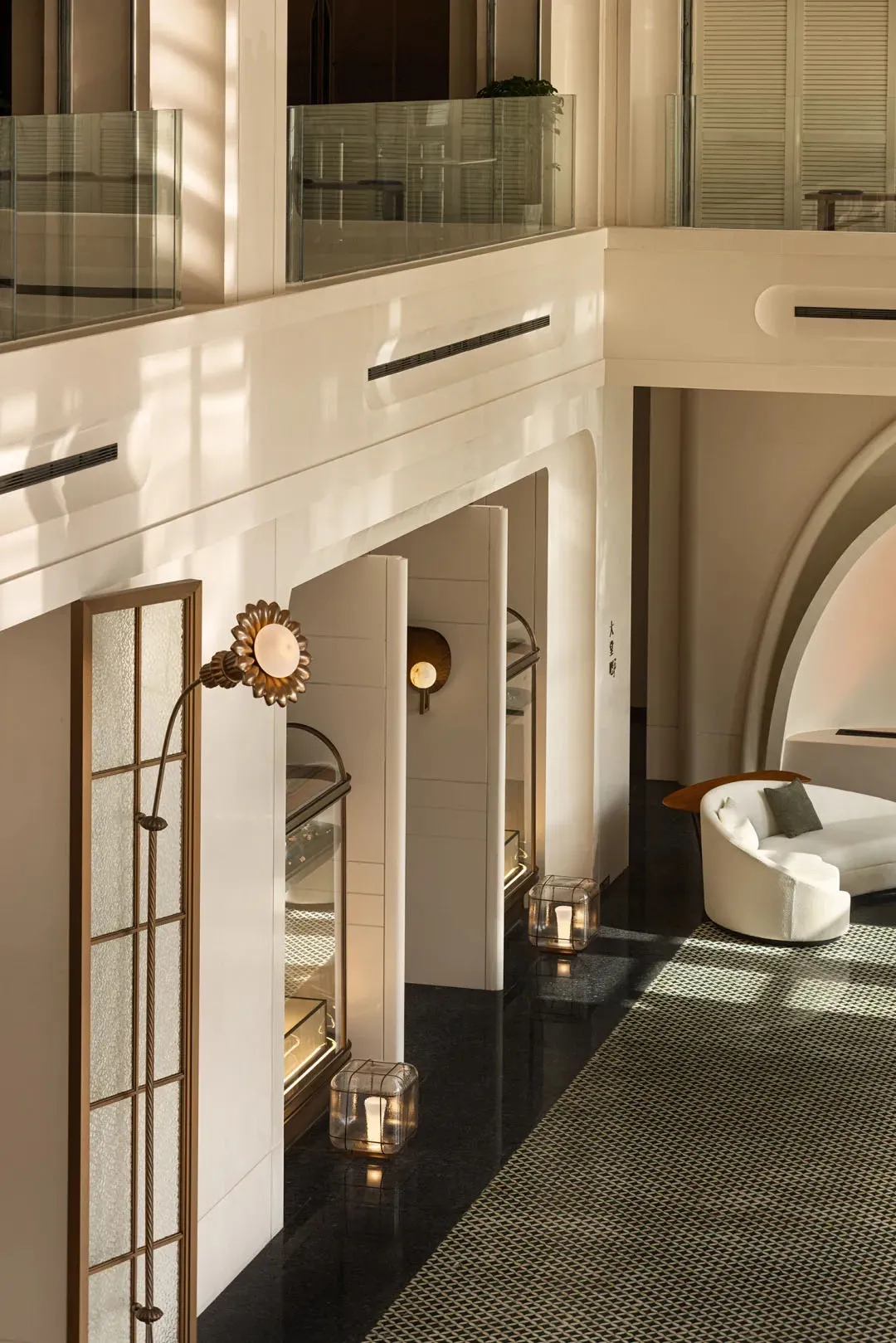 Modern interior space featuring luxury materials like marble and glass.