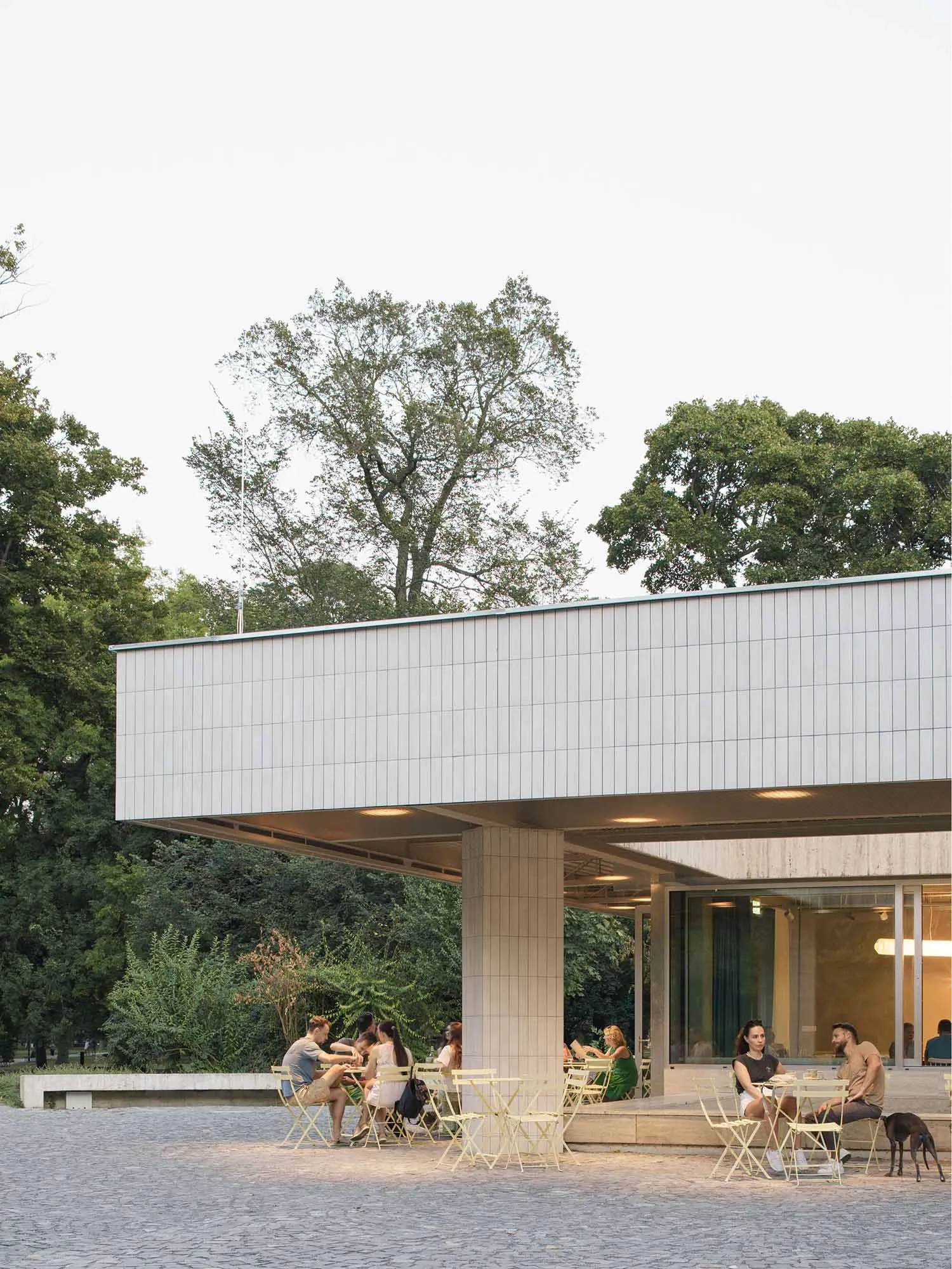 Outdoor cafe with concrete shed and modern design