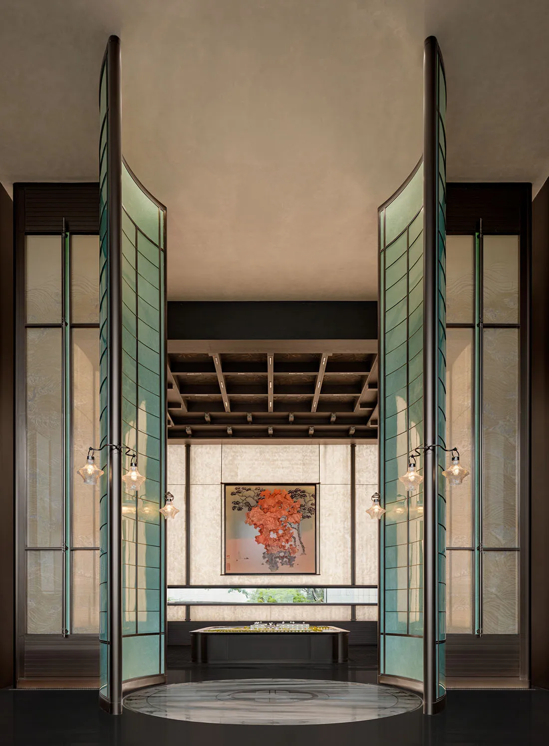 A modern lobby with large glass doors and a painting on the wall.