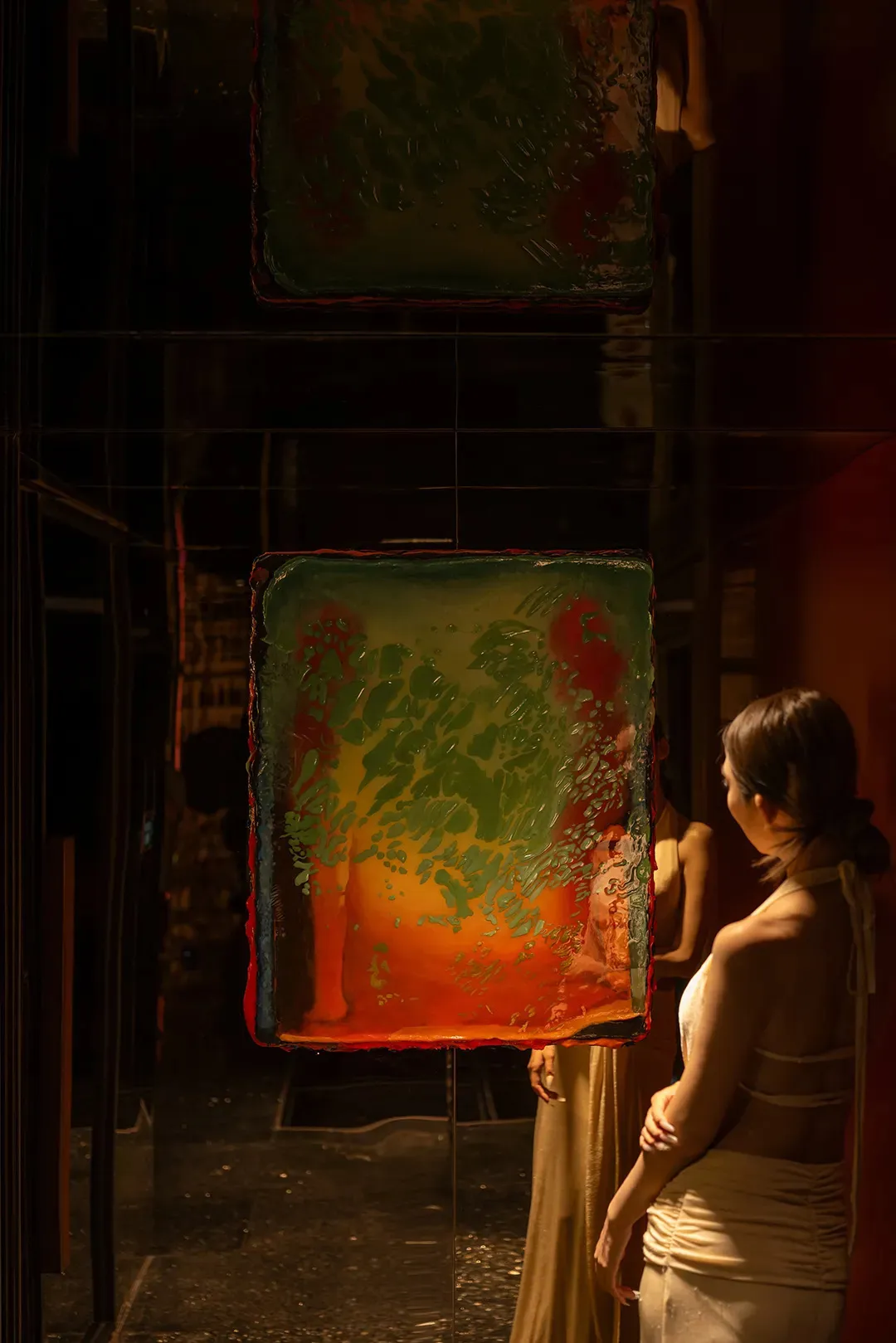 A modern art installation featuring mixed media elements in vibrant colors.